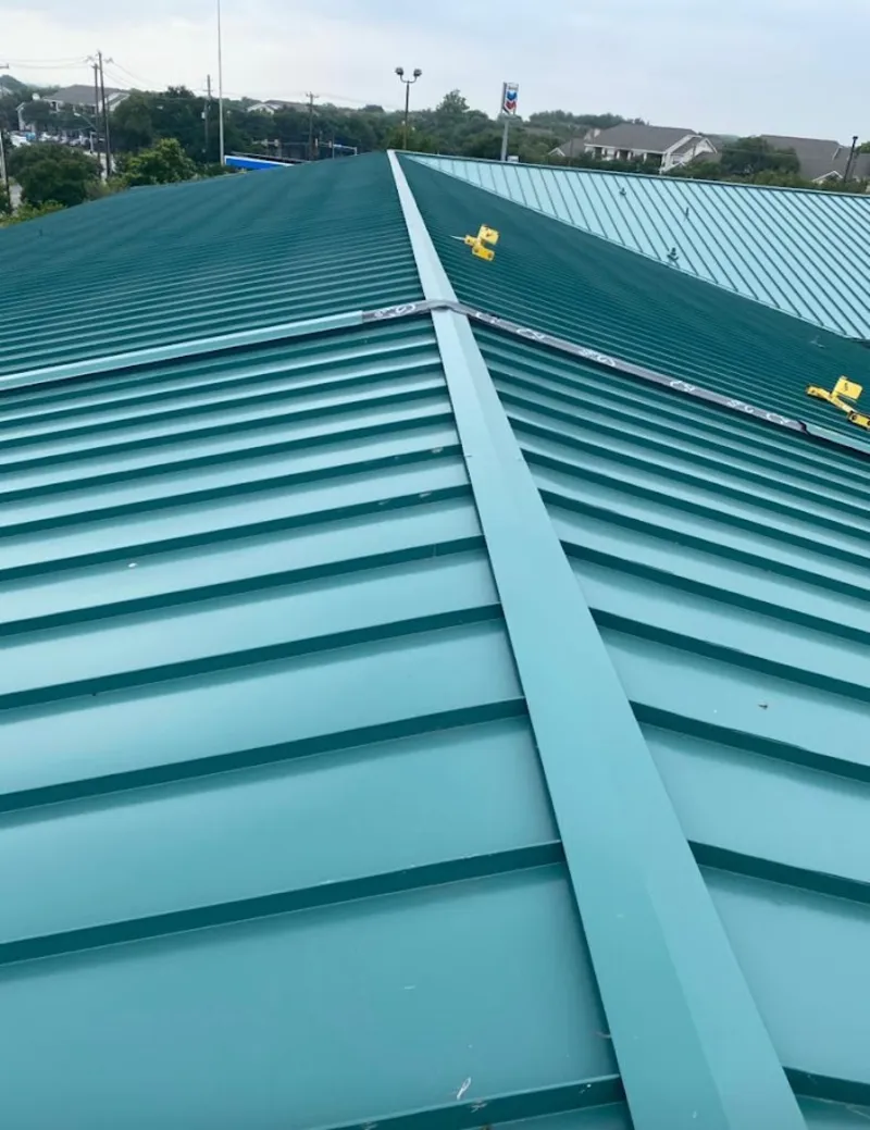 Green commercial metal roof ridge and valley for Metal Roof Repair in Lake Los Angeles